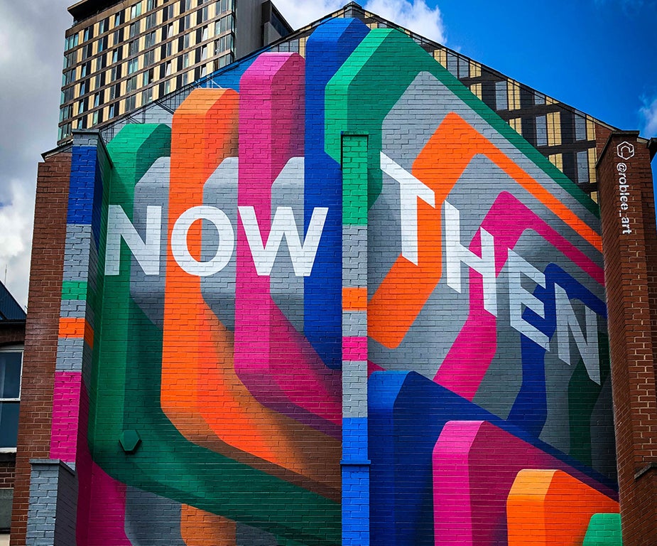 Now and then wall mural
