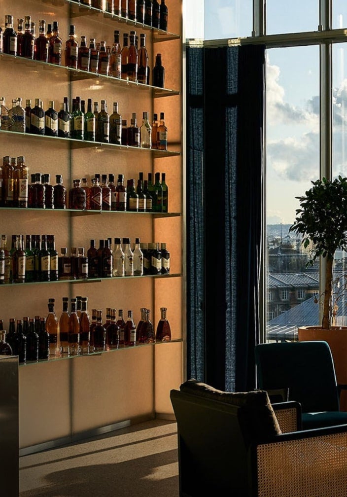 Pernod Ricard spirits are shown in a lounge with a view