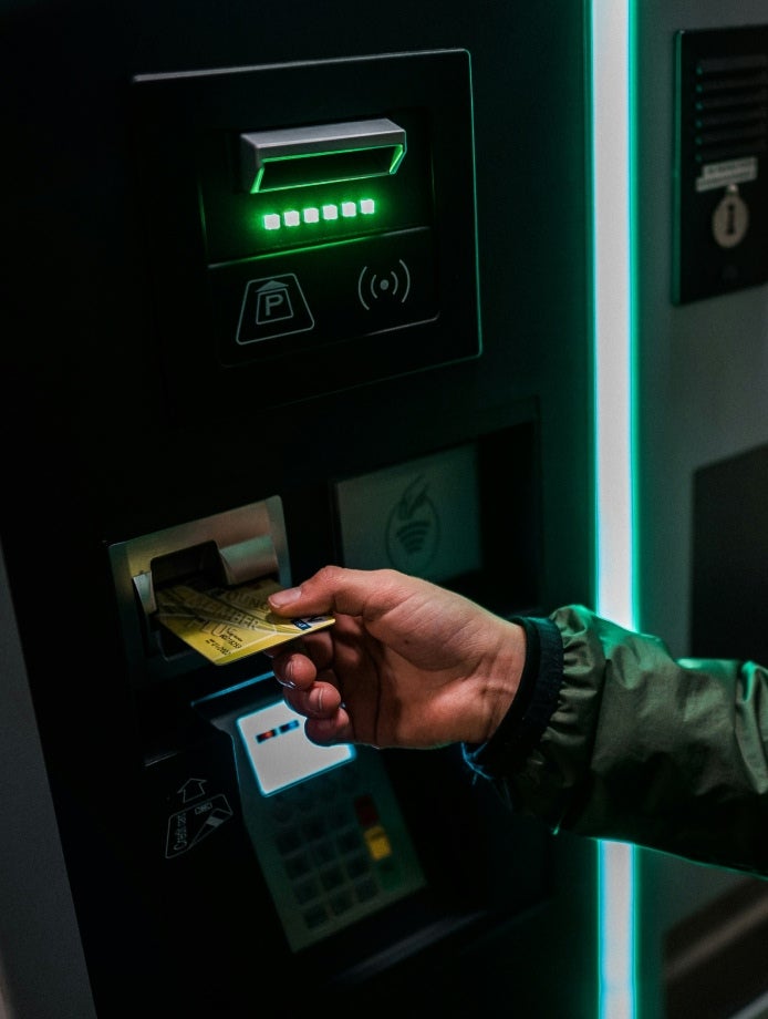 someone using an atm