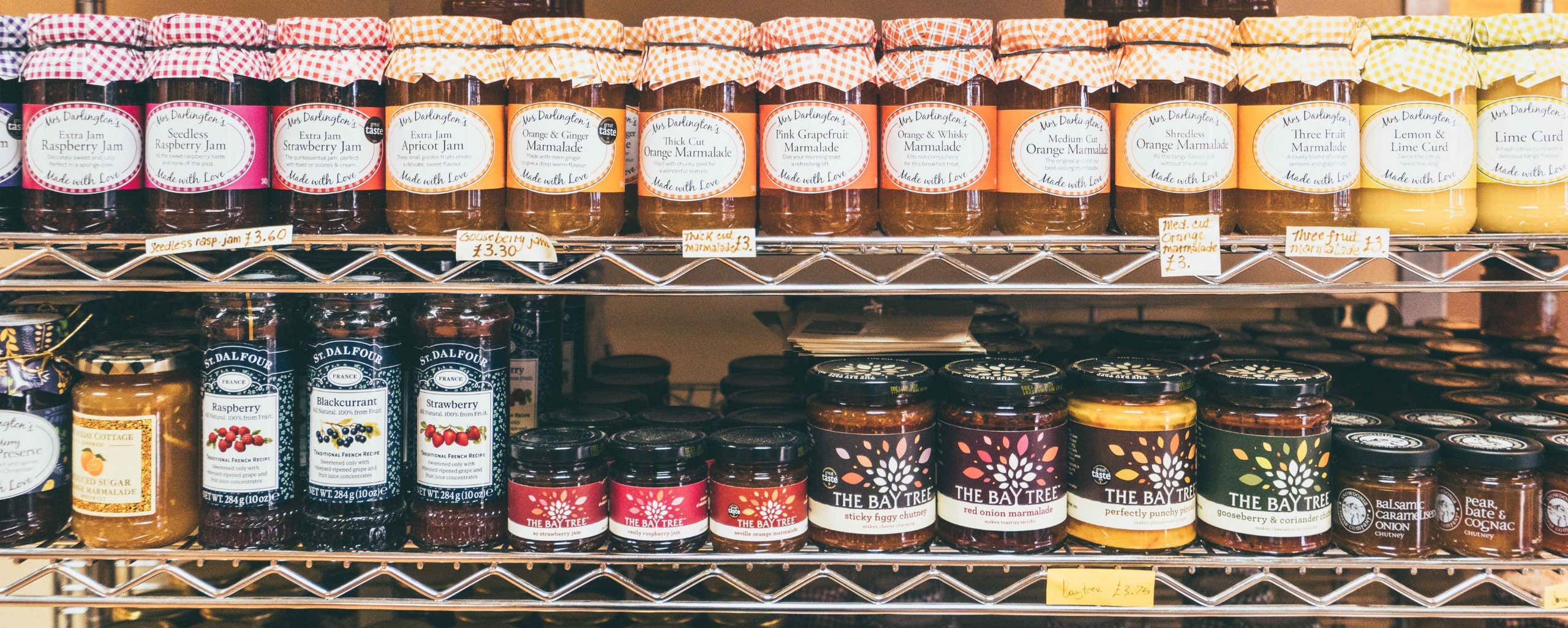 variety of jams on a shelf