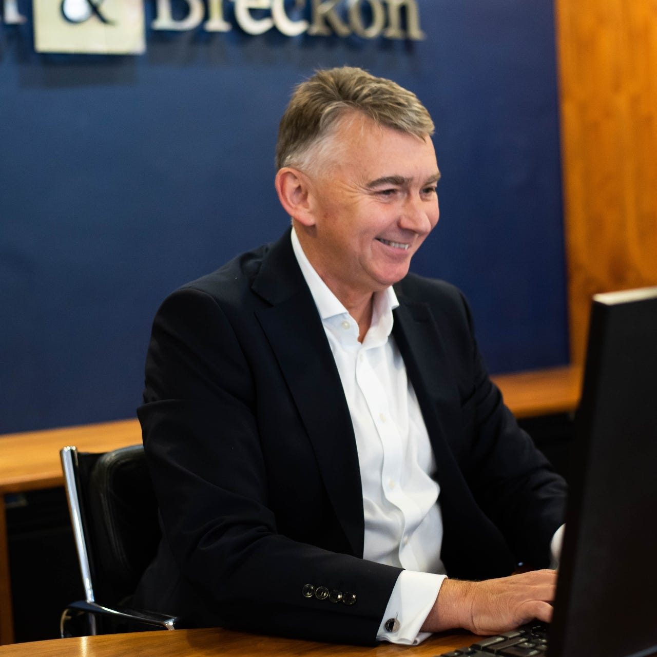 Wayne at desk