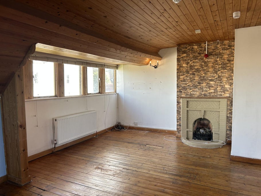 The living room inside the former learning disability care home, Dane End House, in Westgate-on-Sea, Kent.