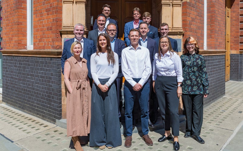 Christie & Co's dental team in July 2026, stood outside the company's London office
