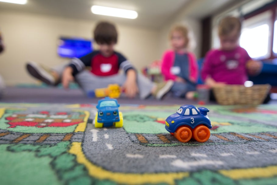 Image of children playing with toy car set