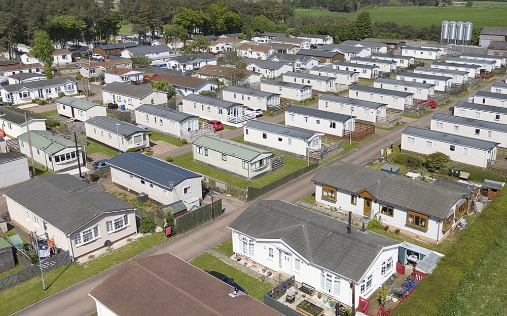 Ariel shot of a holiday park, depicting rows of holiday homes.