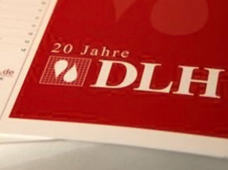 Ein Flyer mit dem Aufdruck 20 Jahre DLH Ein Flyer mit dem Aufdruck 20 Jahre DLH