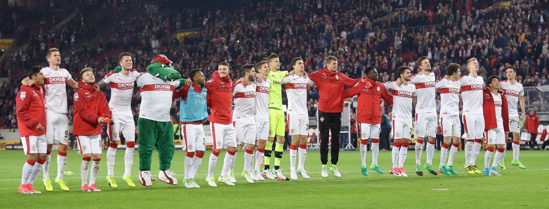 Eine Gruppe von Fußballspielern auf einem Feld Eine Gruppe von Fußballspielern auf einem Feld
