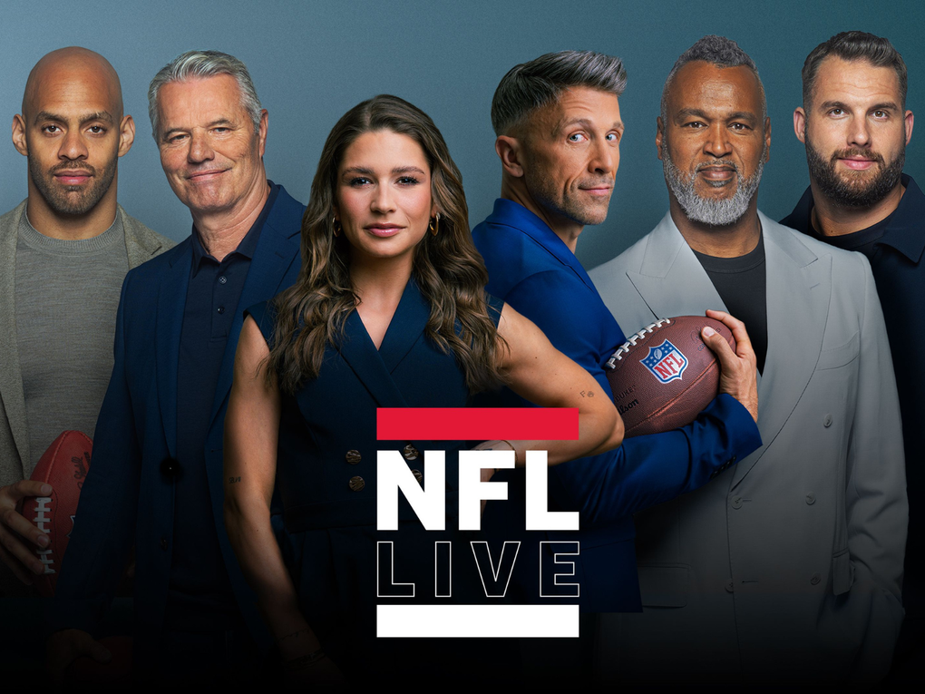 Eine Gruppe von Menschen posiert für ein Foto Eine Gruppe von Menschen posiert für ein Foto