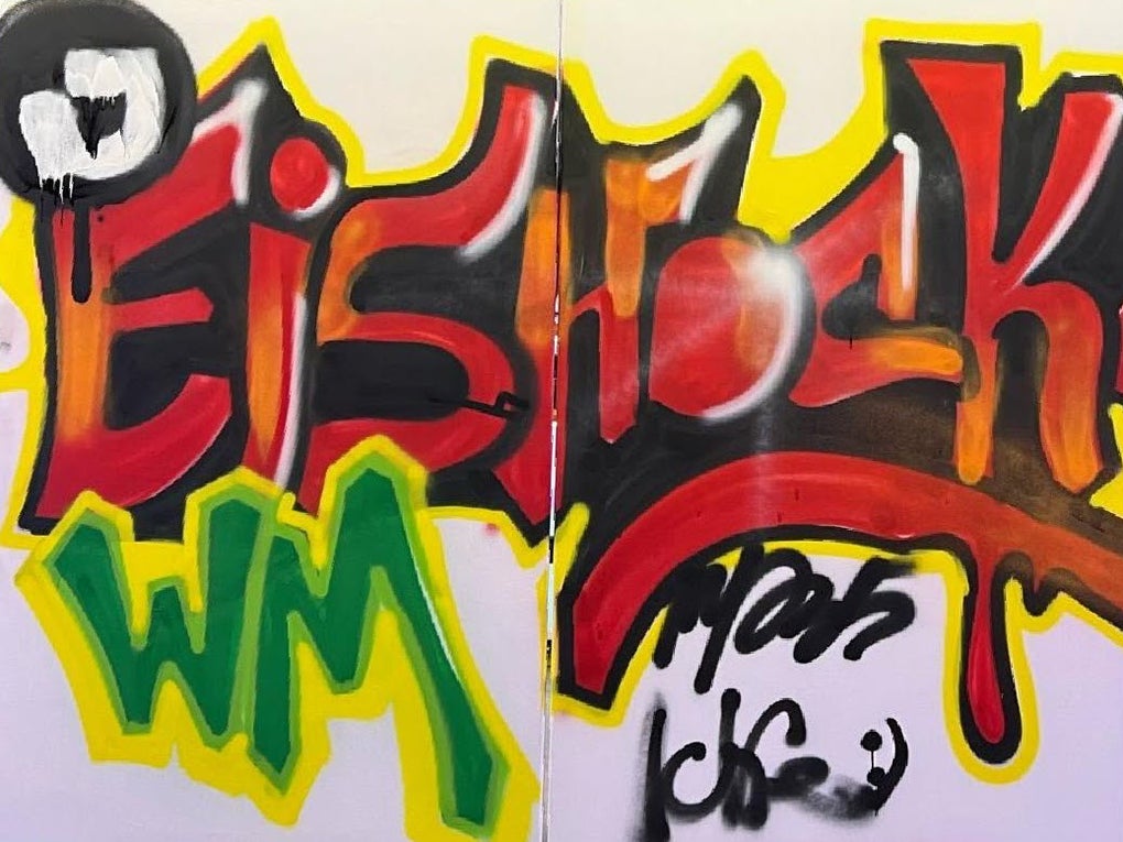 Ein Graffiti an einer Wand Ein Graffiti an einer Wand