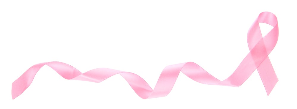 Eine rosa Schleife auf weißem Hintergrund Eine rosa Schleife auf weißem Hintergrund