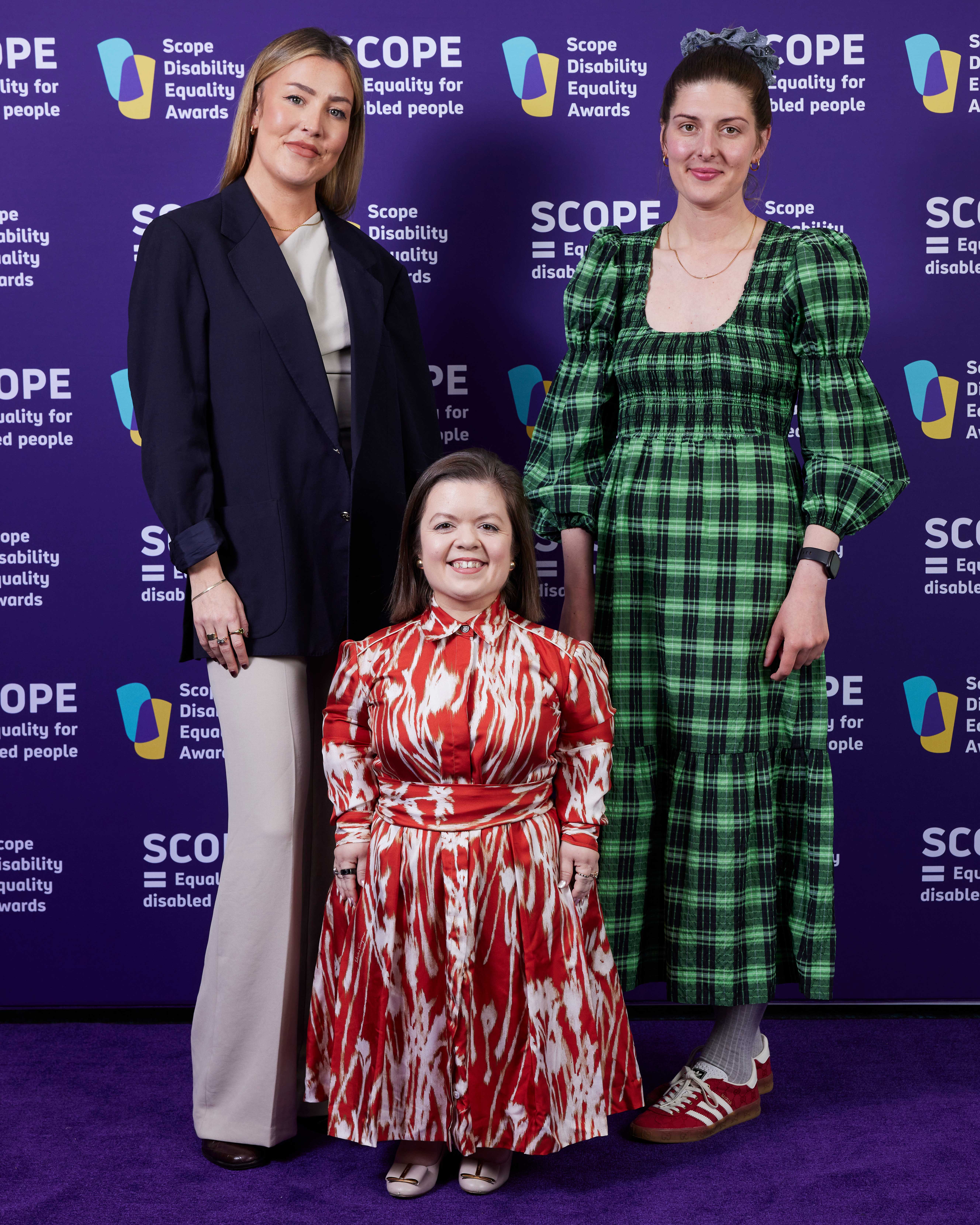 A group of women posing for a photo