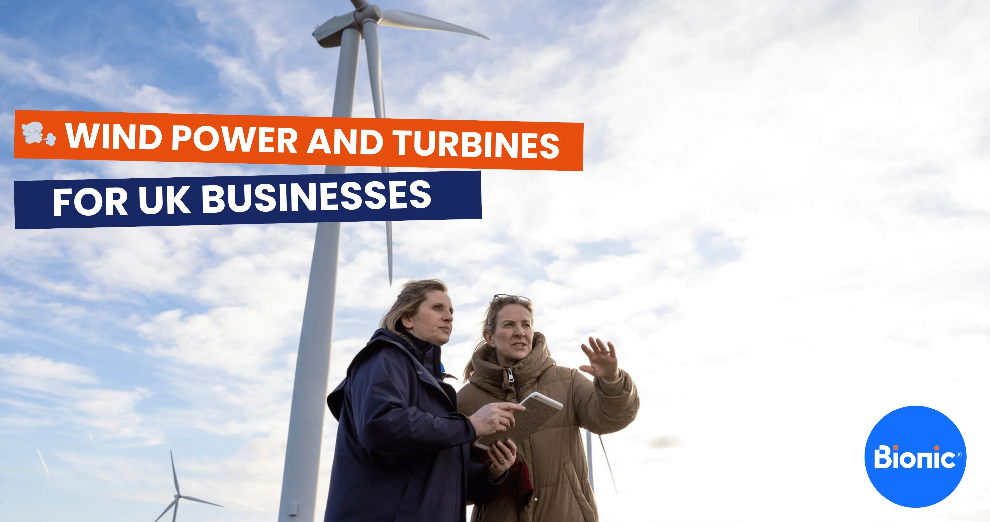 Two female business owners standing in front of a large wind turbine. The caption reads: wind power and turbines for UK businesses