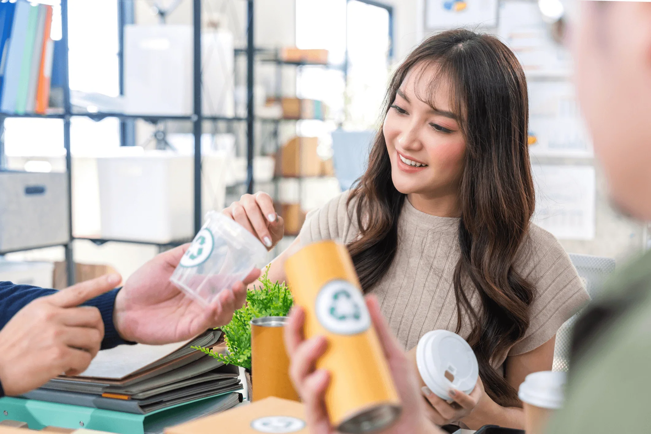 A business owner tries out sustainable cartons for her business