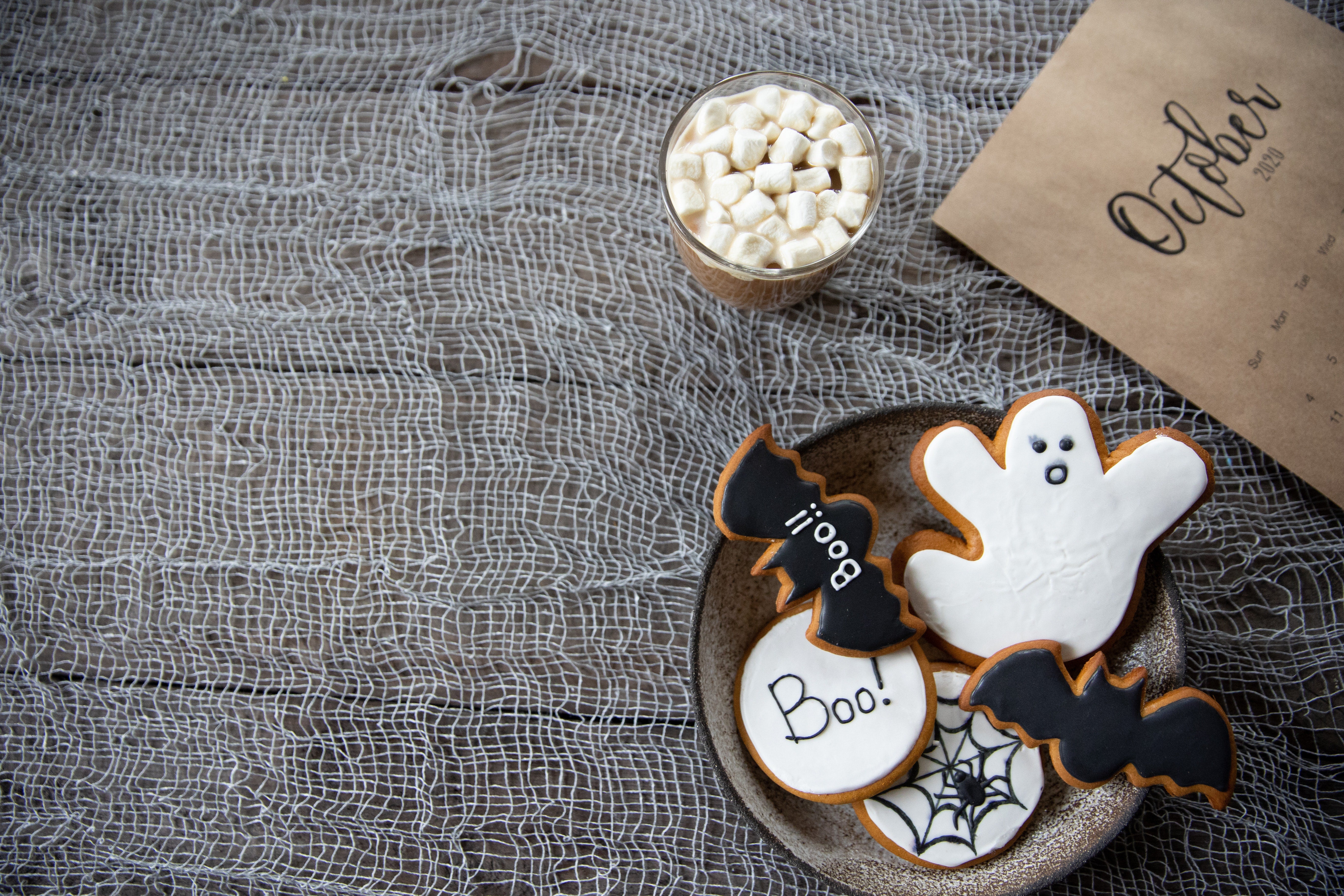 A selection of ghost biscuits in a bowl