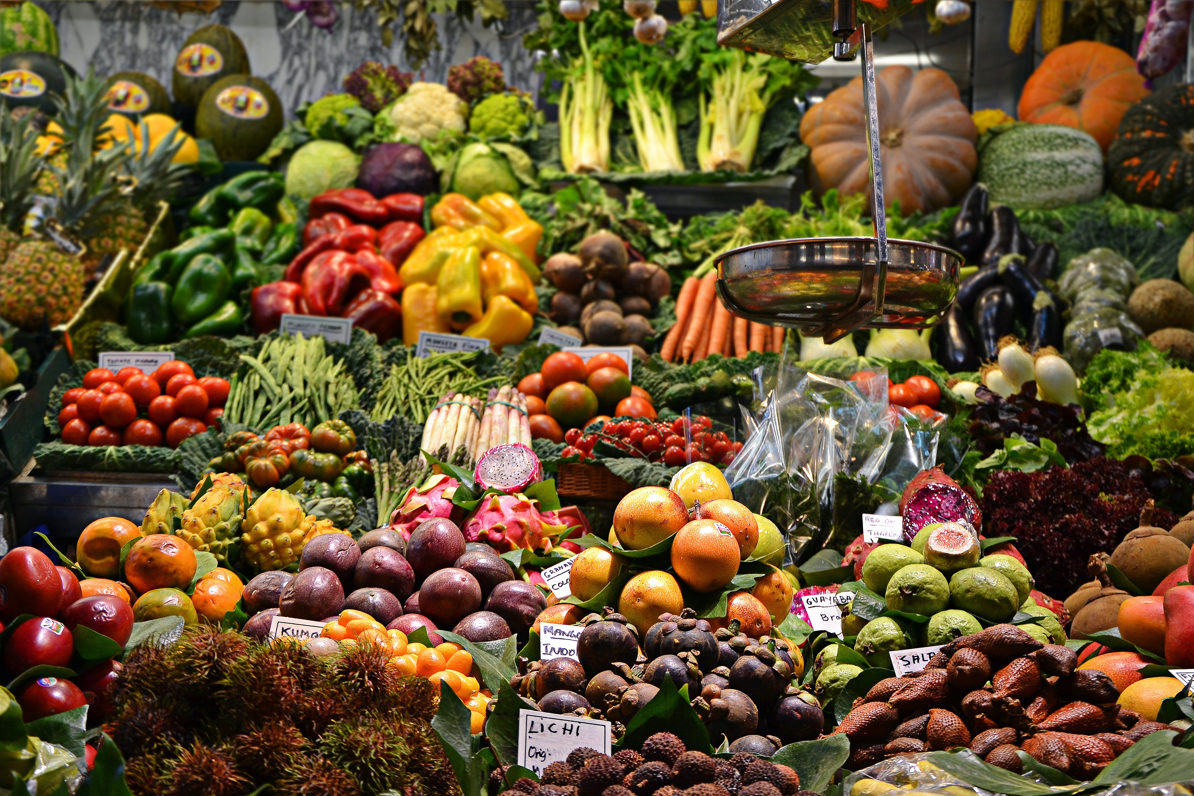 A fruit and veg stall with a colourful range of fruit and vegetables