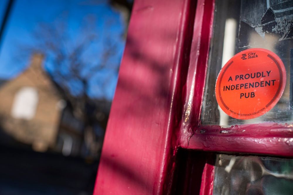 The Star of Greenwich displays a pink 'proudly independent pub' sticker. Photo by Josh Bright.