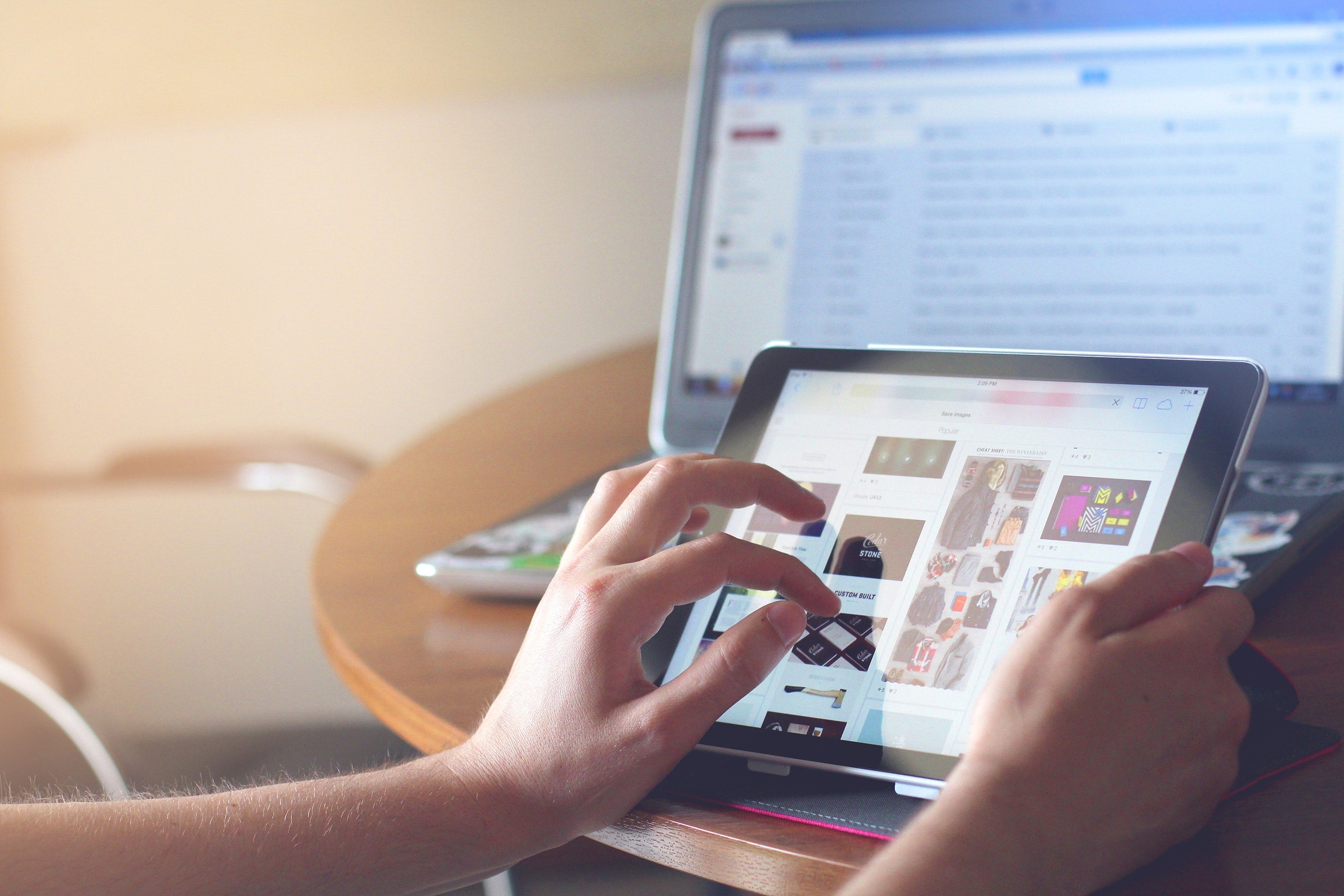 A broadband user browses the internet on a tablet