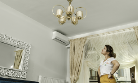 A property owner looks a damage to the ceiling of their commercial property