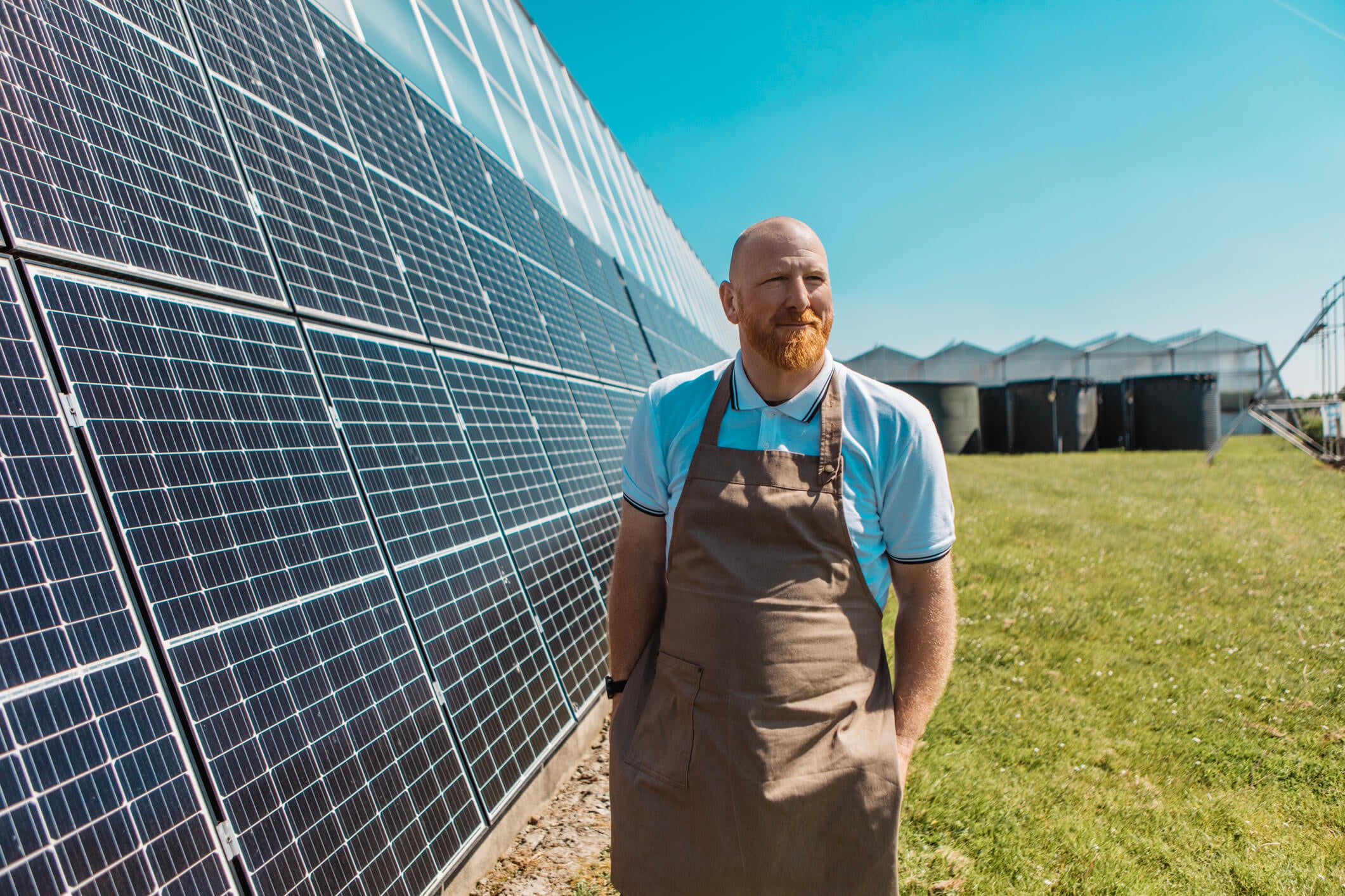 small business owner working on the daily duties on a commercial solar panel site