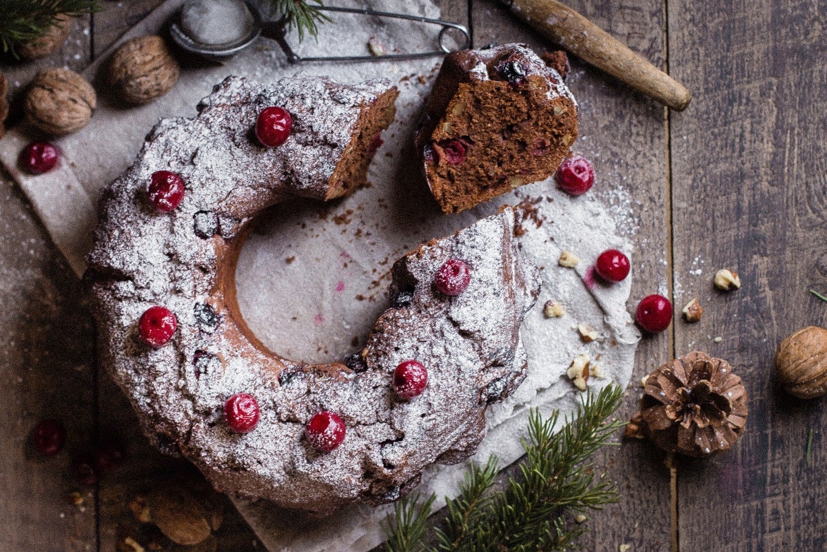 A chocolate Christmas wreath with a slice cut from it