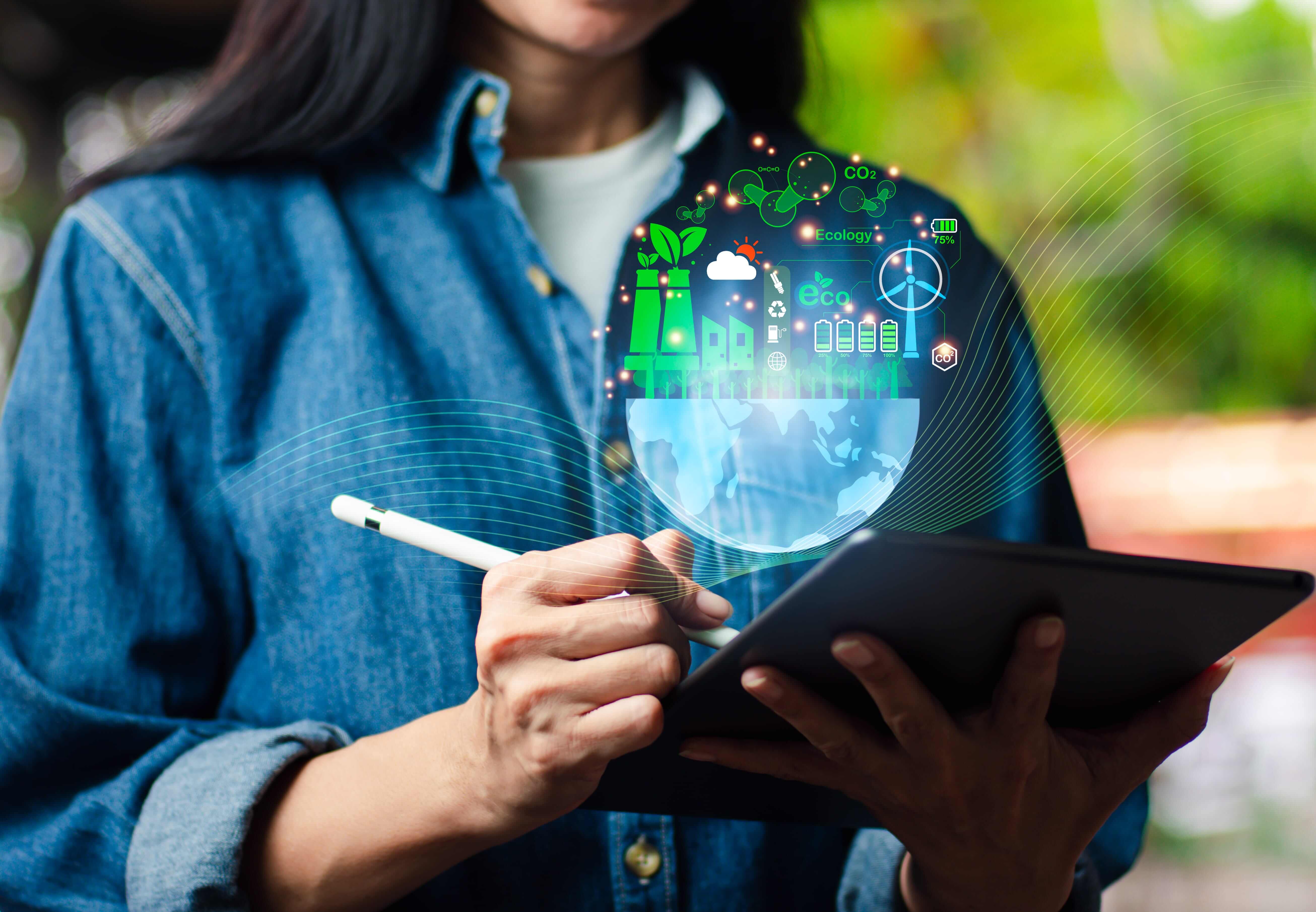 woman holding a clipboard and pen with world graphic floating above