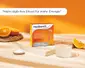 Orangene Medibiotix Fit Packung auf einer Steinplatte mit Orangen und Glas.