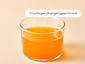 Glas mit orangener Flüssigkeit mit dem Hinweis: Fruchtiger Orangengeschmack.
