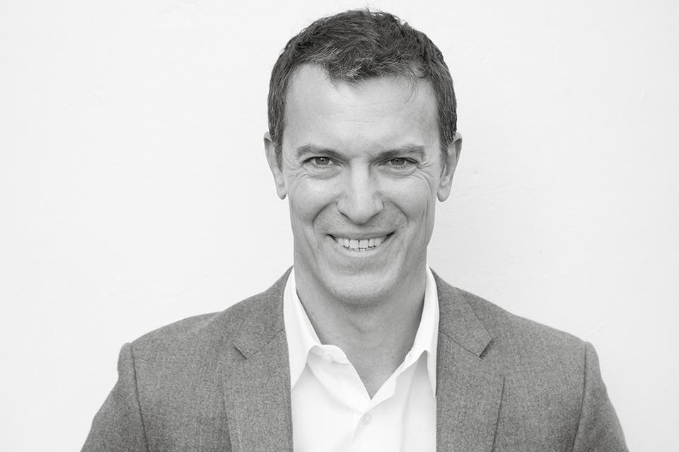 A Headshot of Michael Komasinski, Global CEO for Merkle
