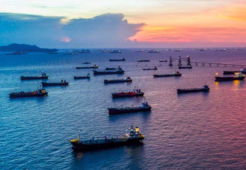 A busy port at night