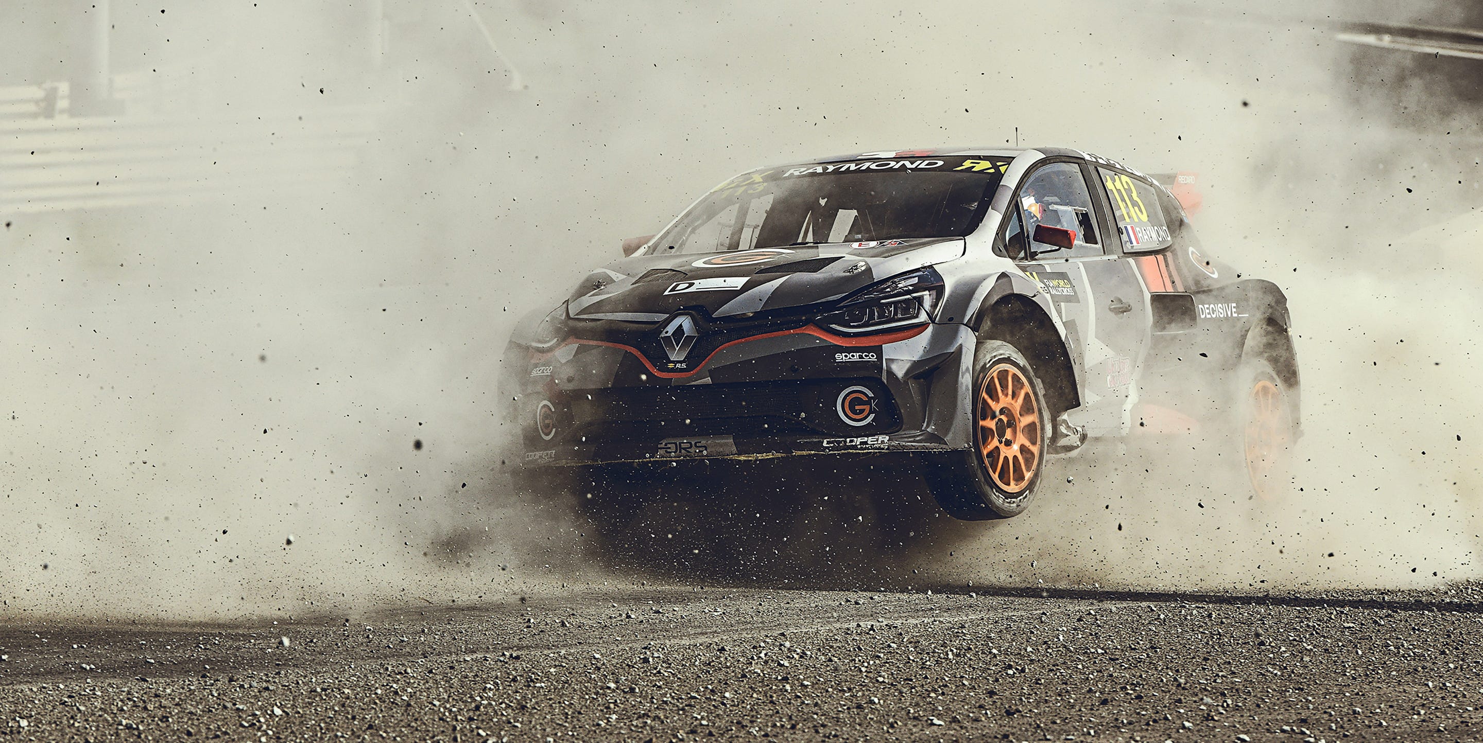 Rally car on gravel track