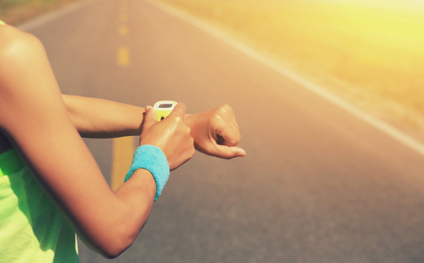 Person checking their running performance 