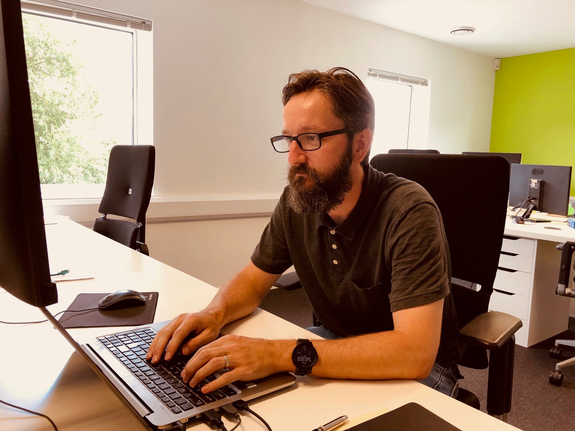 Chris working at his desk 