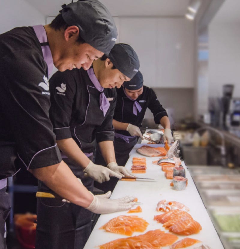 Sushi chefs working