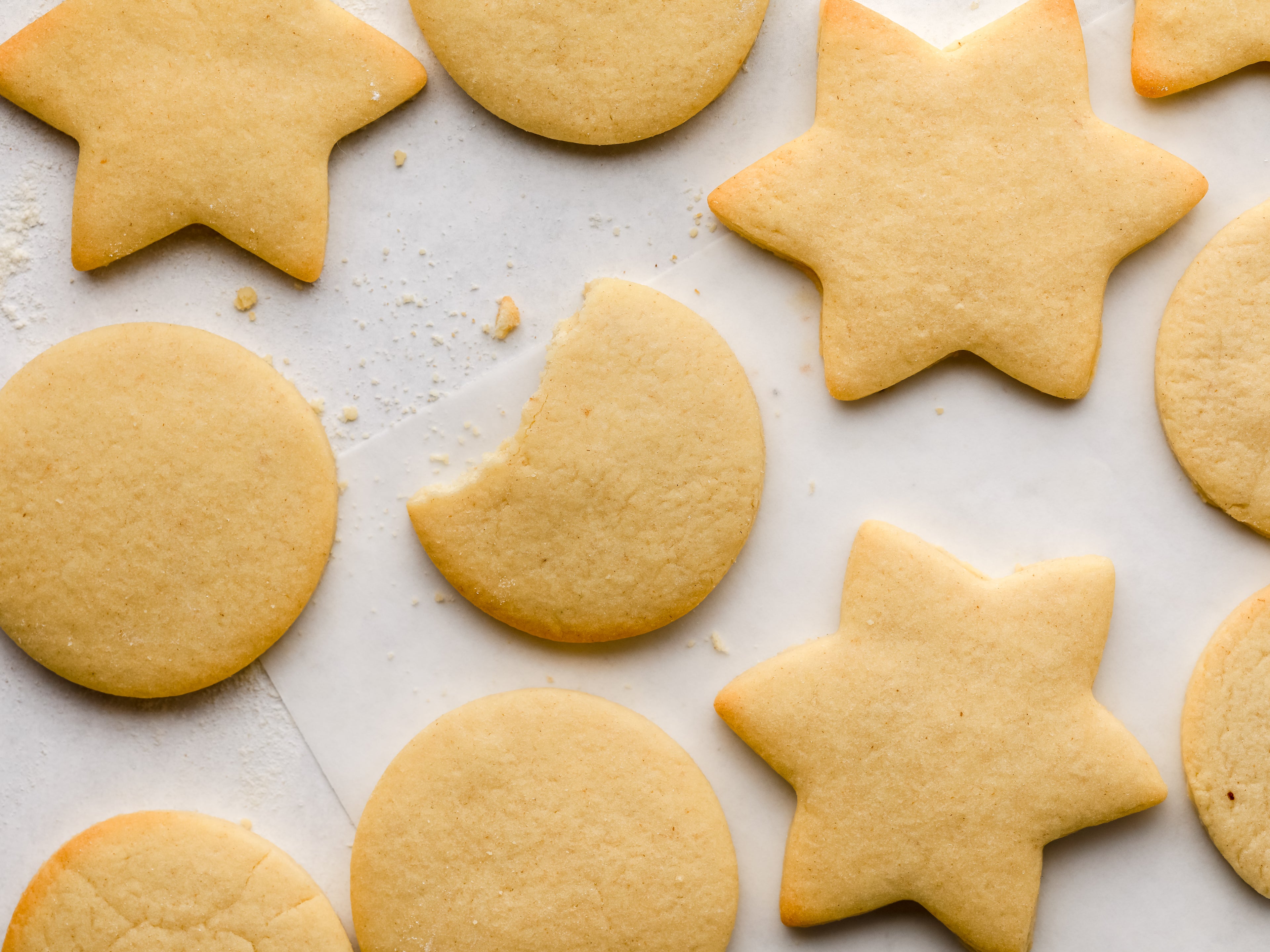 Close-up of homemade star-shaped and circular plain biscuits