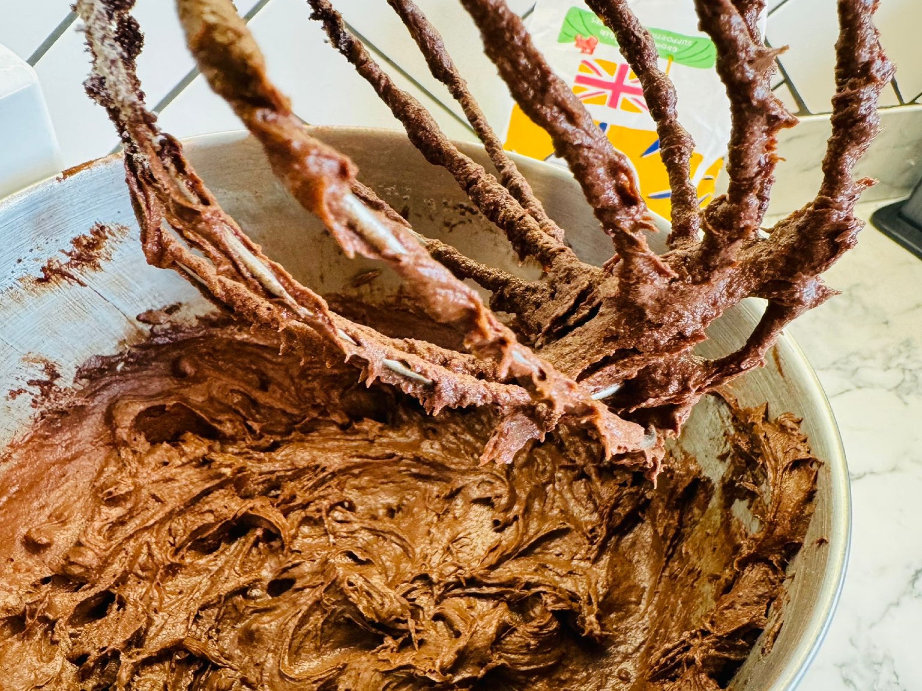Close-up of mixing together the ingredients for Mary Berry's brownie recipe