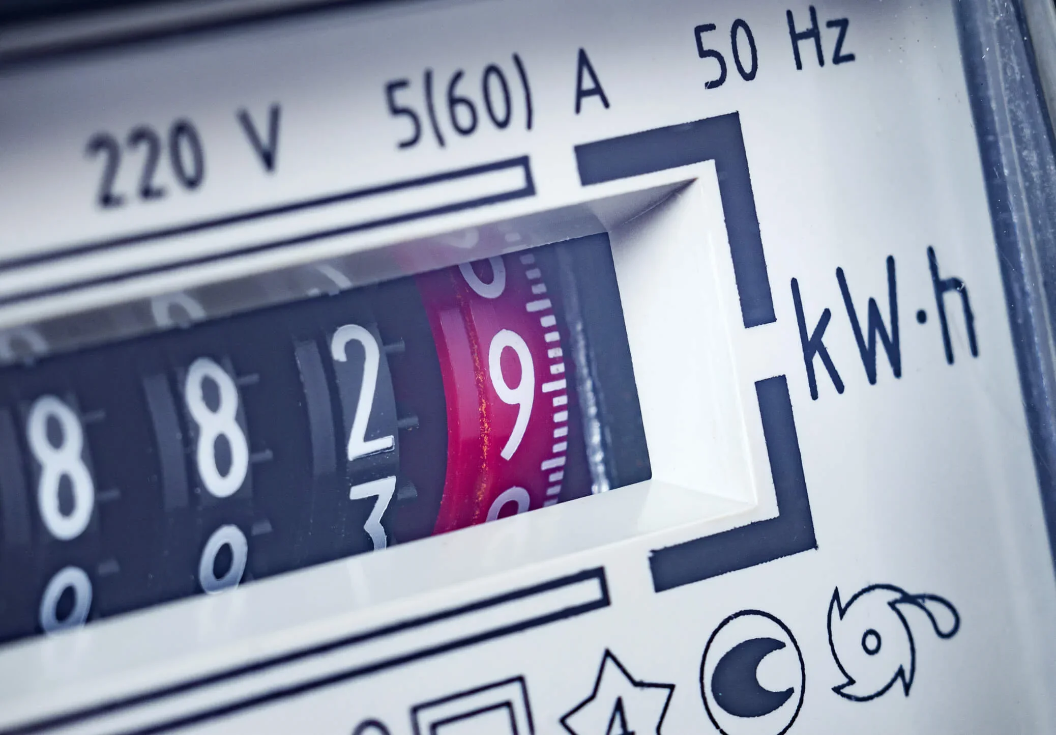 Dials on a business energy meter showing how much energy has been used.