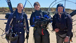 Simon Reeve in Ireland with two paramotorists