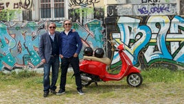Andrew Graham-Dixon and Giorgio Locatelli stand by a Vespa scooter in Rome
