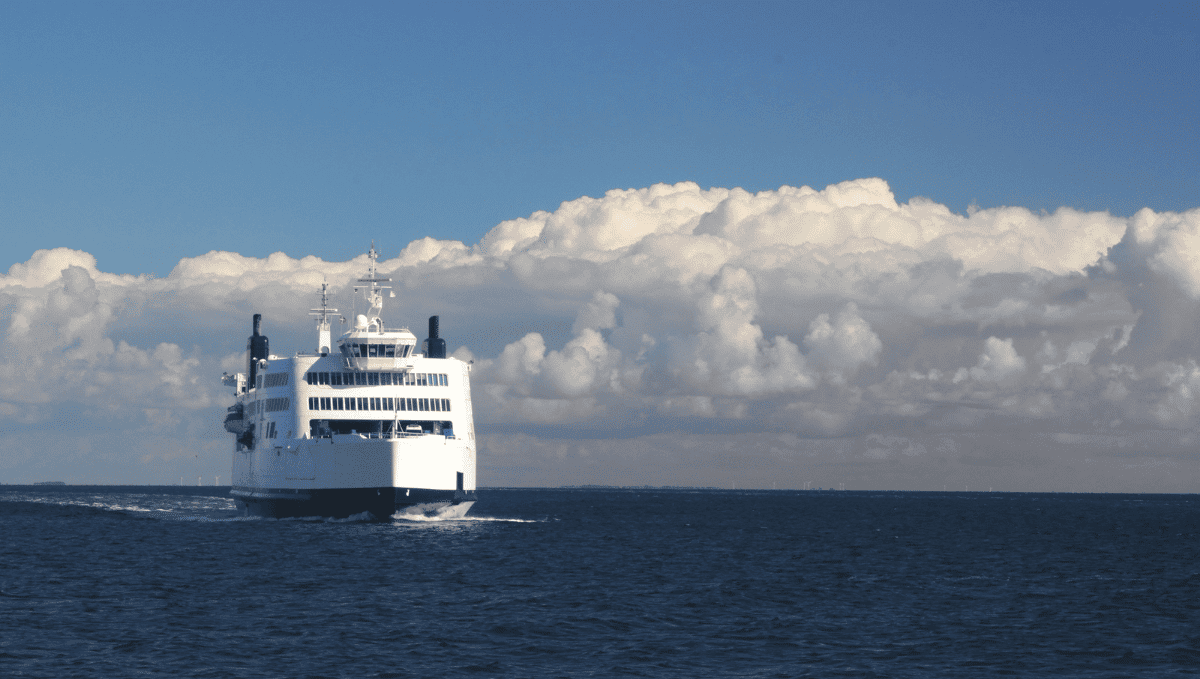 A white ferry boat on open water