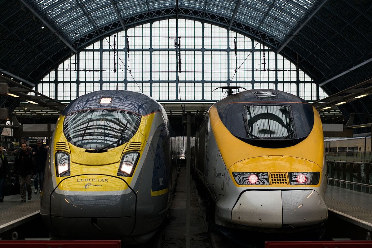Two Eurostar trains in a station