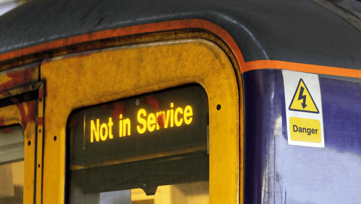 Close up of train carriage displaying 'not in service' sign