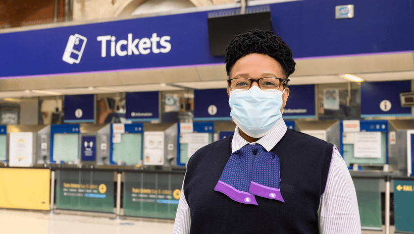 GTR Victoria station staff member wearing a mask.