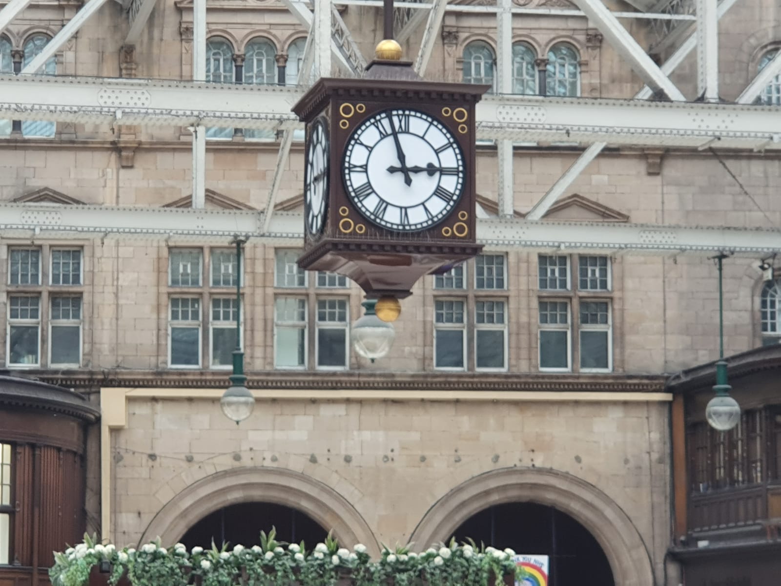 old fashioned clock hanging from the ceiling in Glasgow Central (C) Liz Warren-Corney