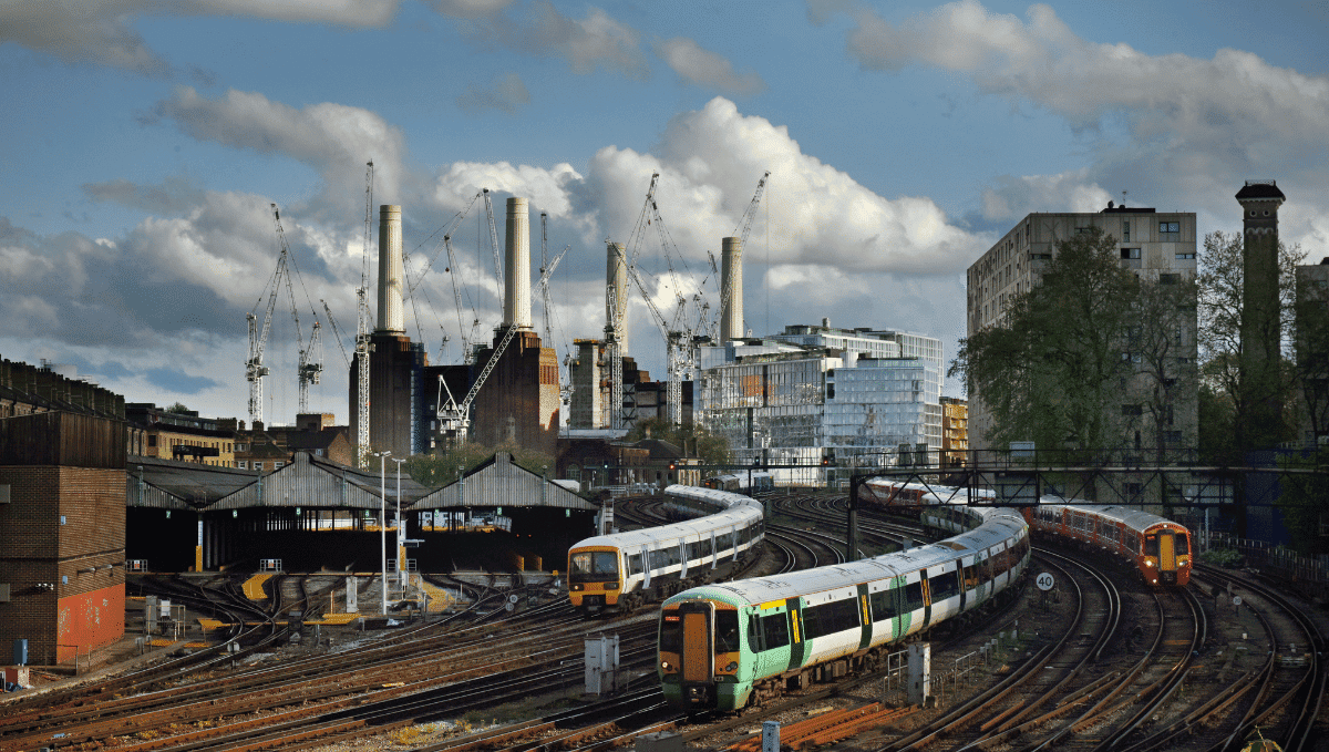 View of Battersea Power Station with London Overground, Southeastern and SWR trains in foreground