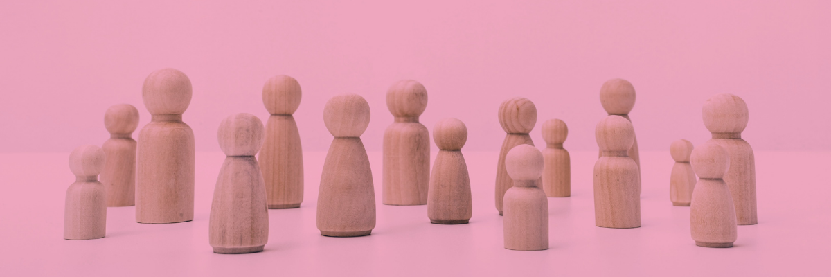 A collection of wooden figures representing people.