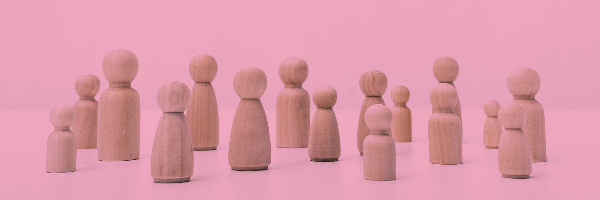 A collection of wooden figures representing people. 
