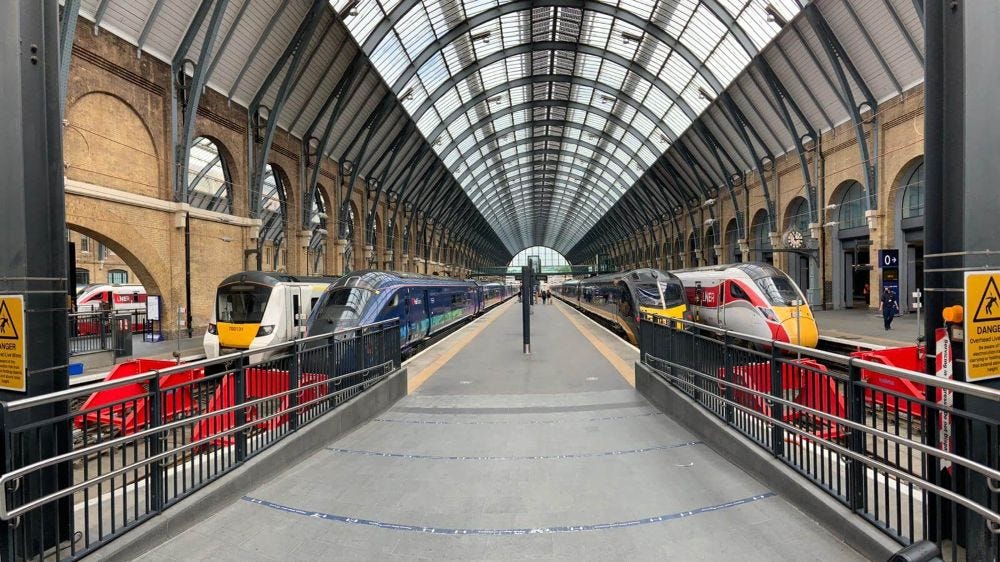 Four different trains at Kings Cross platforms