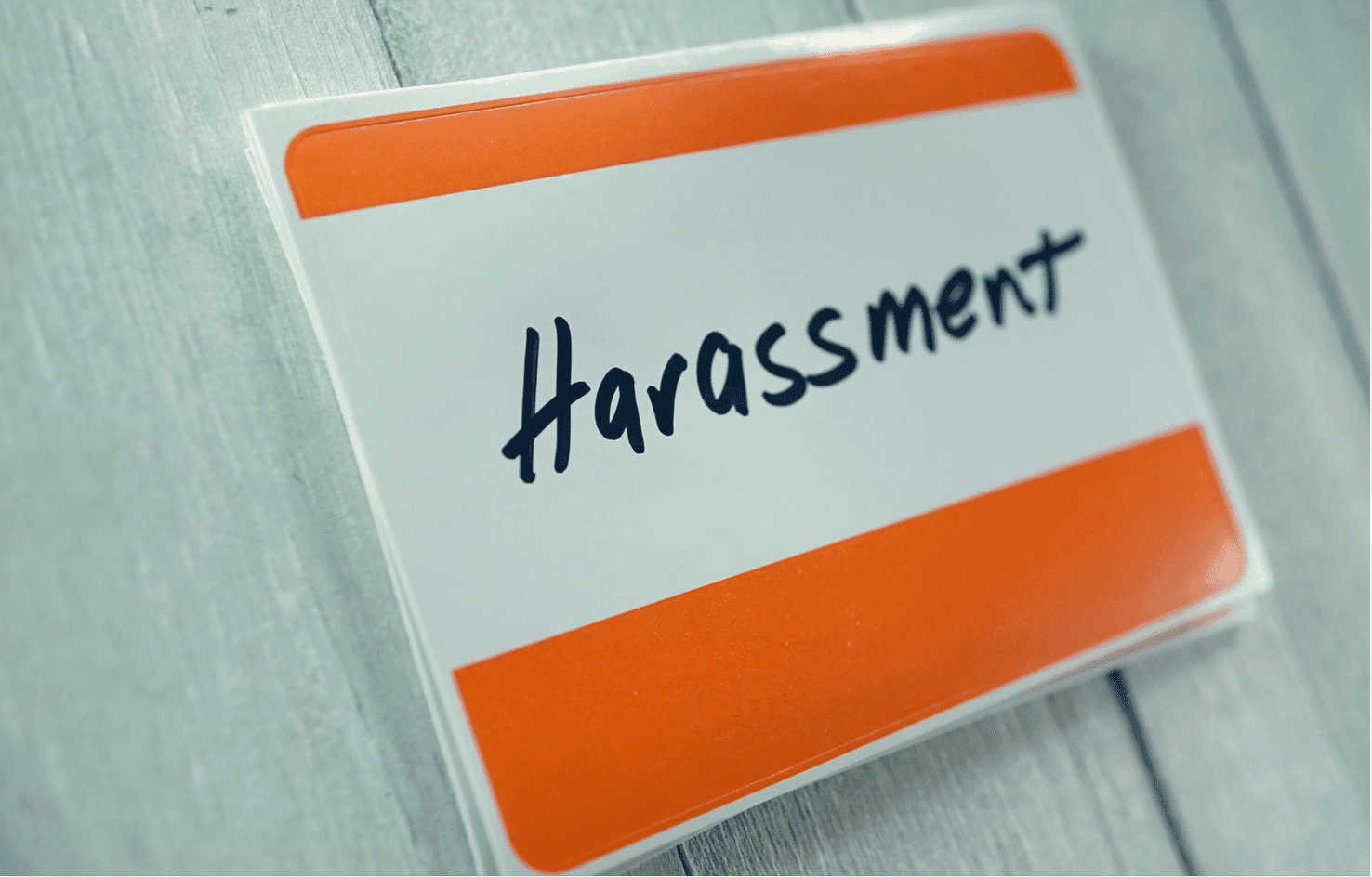 Image of a rail ticket with the word 'harassment' written on it.