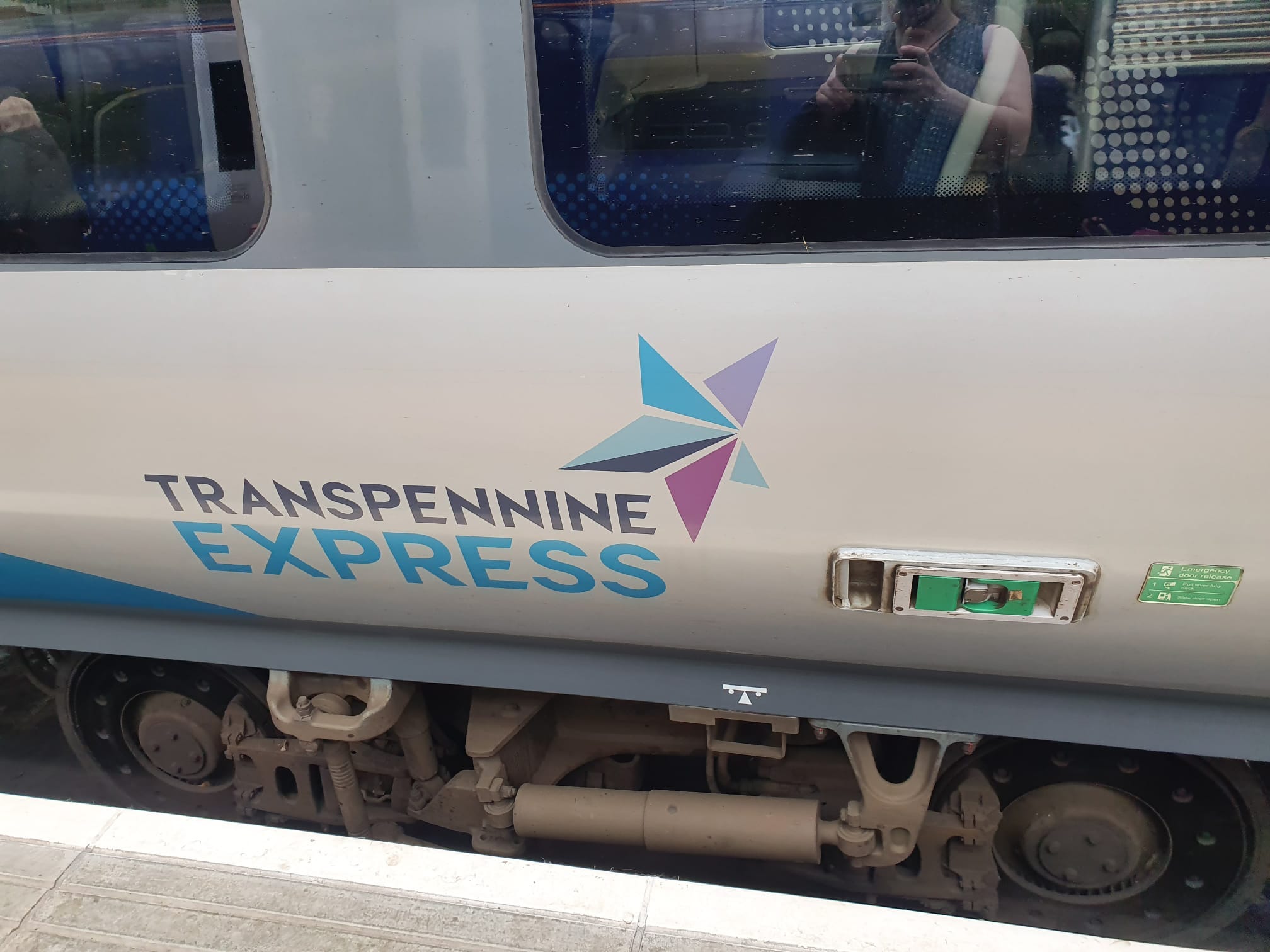 A train carriage, with the words "Transpennine Express" and a blue and purple star on the side.