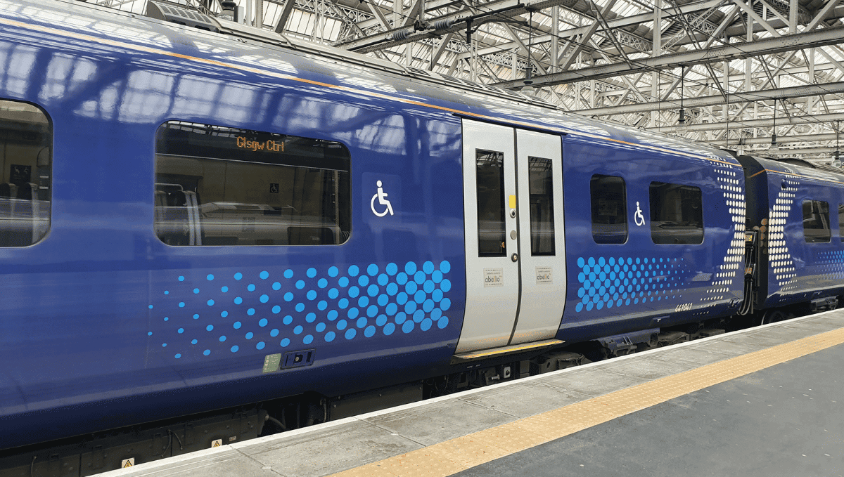 Blue Scotrail train at platform